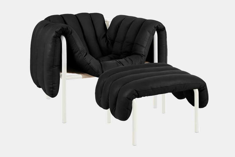 Plump cushioning spills over edges of Faye Toogood's Puffy Lounge Chair